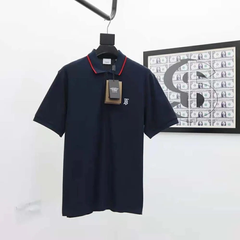 Burberry Icon Stripe Placket Cotton Piqué Polo Shirt for Men in Navy Burberry Icon Stripe Placket Cotton Piqué Polo Shirt for Men in Navy