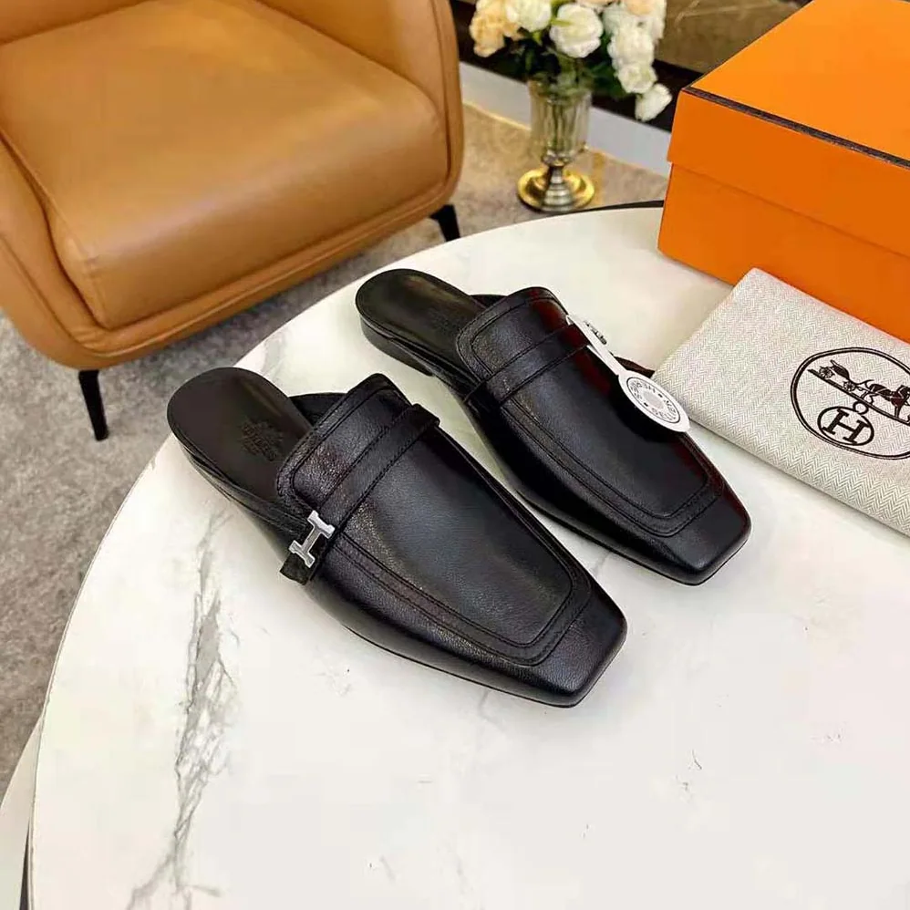 Hermes Groupie Mule in Goatskin with Miniature Palladium-Plated Paris Buckle for Women in Black