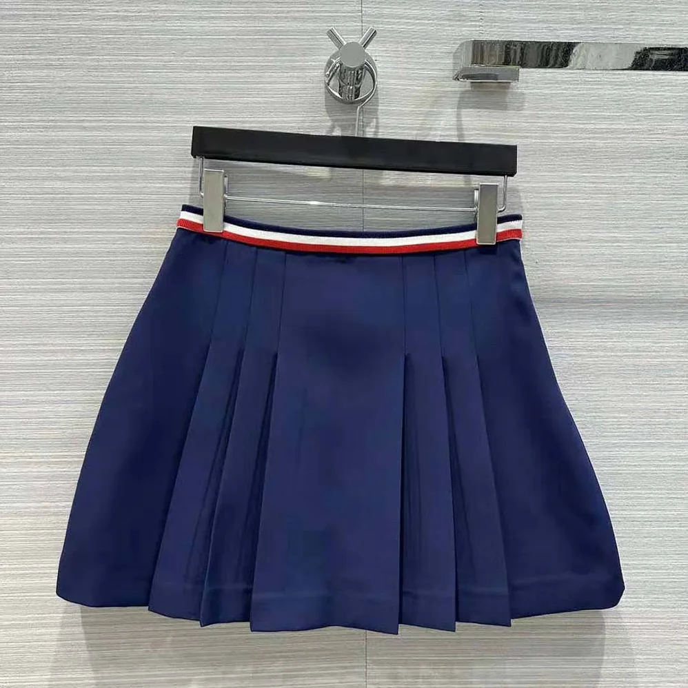 Celine Pleated Mini Skirt in Cotton Gabardine for Women in Navy Celine Pleated Mini Skirt in Cotton Gabardine for Women in Navy