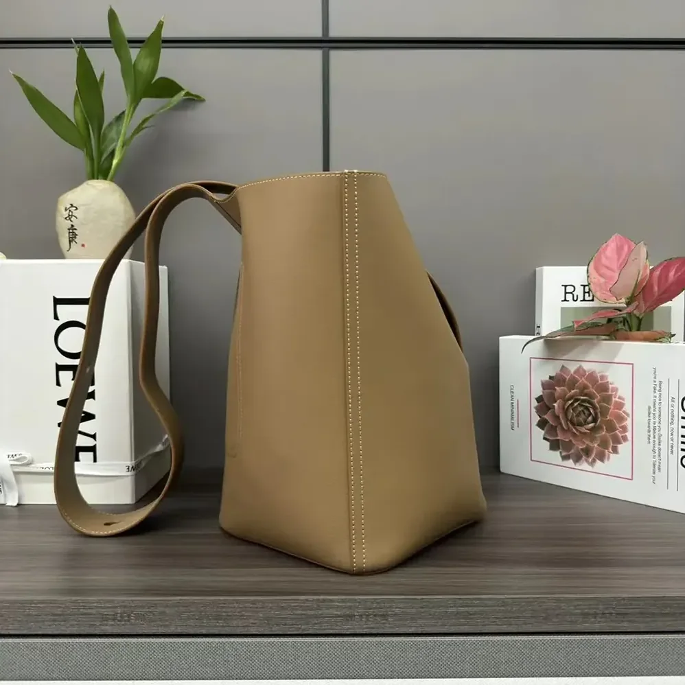 Loewe Mini Pebble Bucket Bag in Soft Grained Calfskin for Unisex in Sandy Loewe Mini Pebble Bucket Bag in Soft Grained Calfskin for Unisex in Sandy
