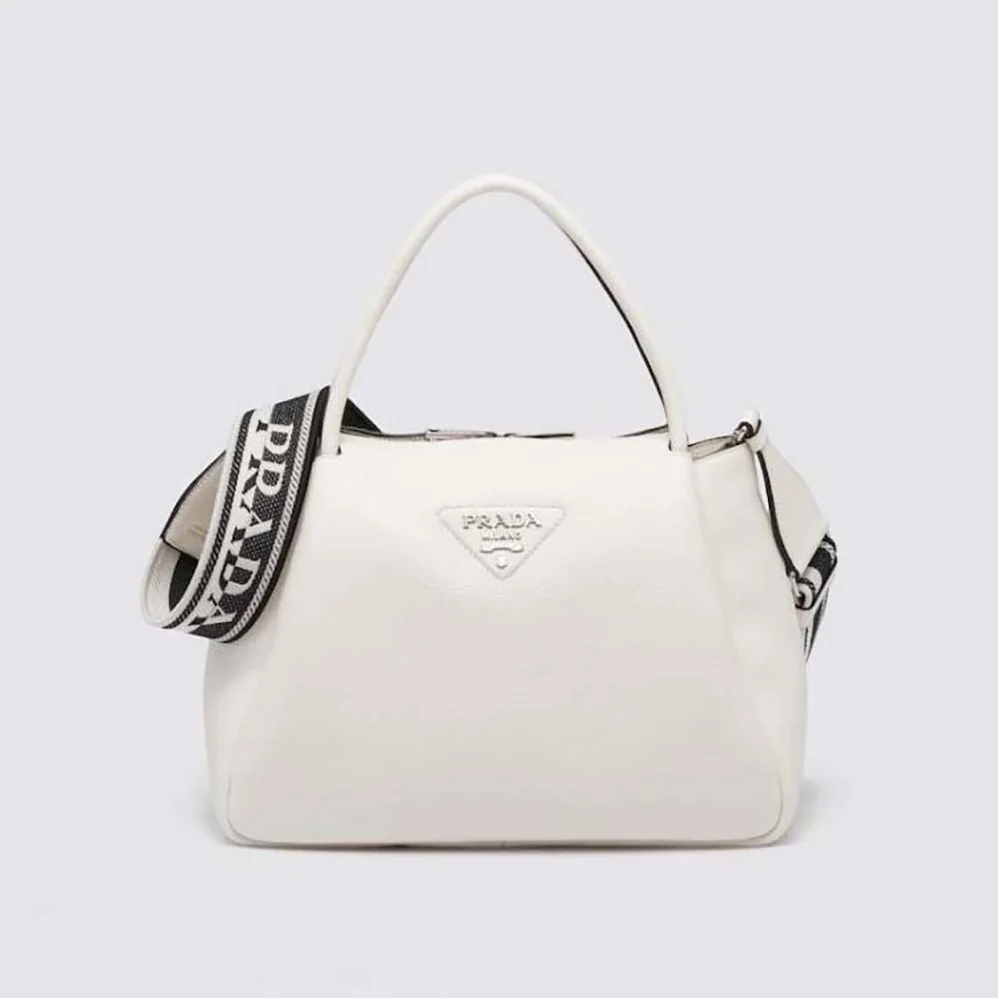 Prada Large Leather Handbag with the Prada Metal Lettering Logo Gleaming at Its Center for Women in White Prada Large Leather Handbag with the Prada Metal Lettering Logo Gleaming at Its Center for Women in White