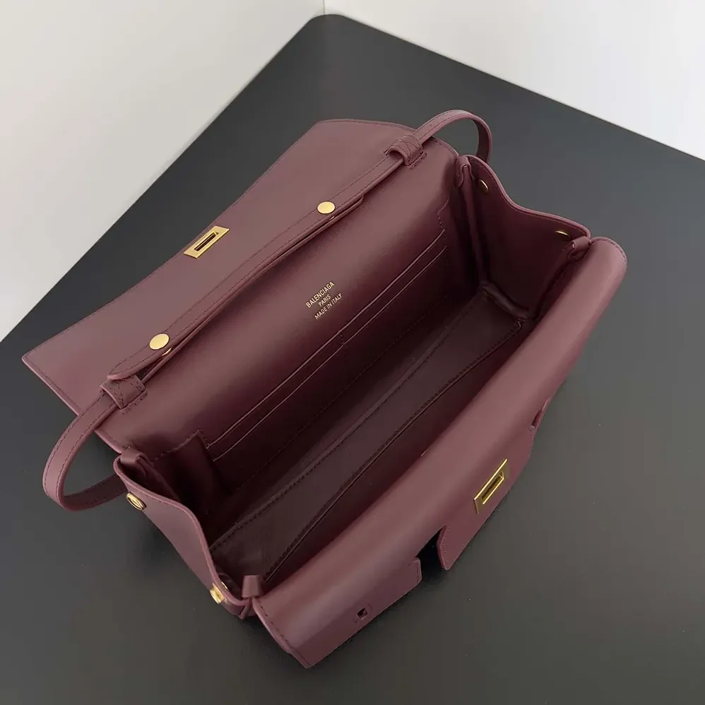 Balenciaga Bel Air Clutch On Strap Small in Dark Burgundy for Women Balenciaga Bel Air Clutch On Strap Small in Dark Burgundy for Women