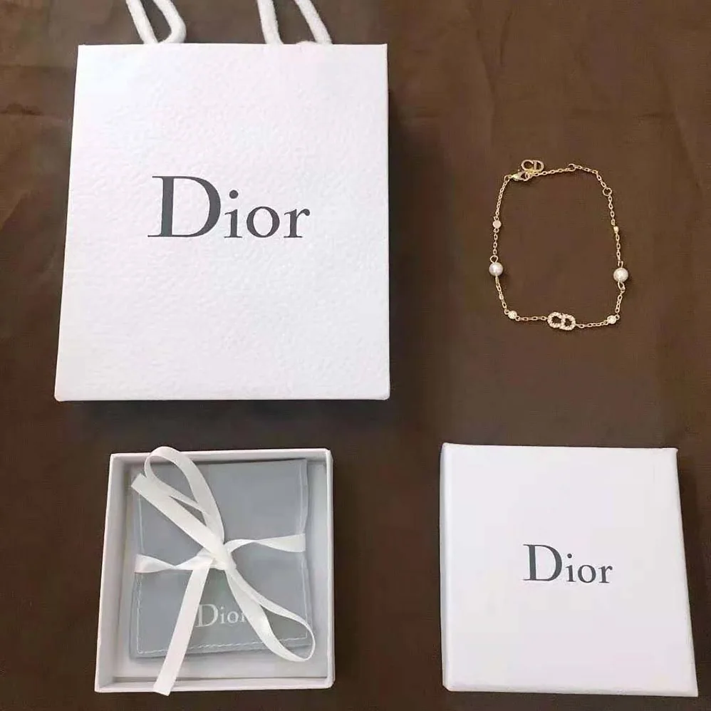 Dior Clair D Lune Bracelet Gold-Finish Metal with White Resin Pearls and White Crystals for Women Dior Clair D Lune Bracelet Gold-Finish Metal with White Resin Pearls and White Crystals for Women