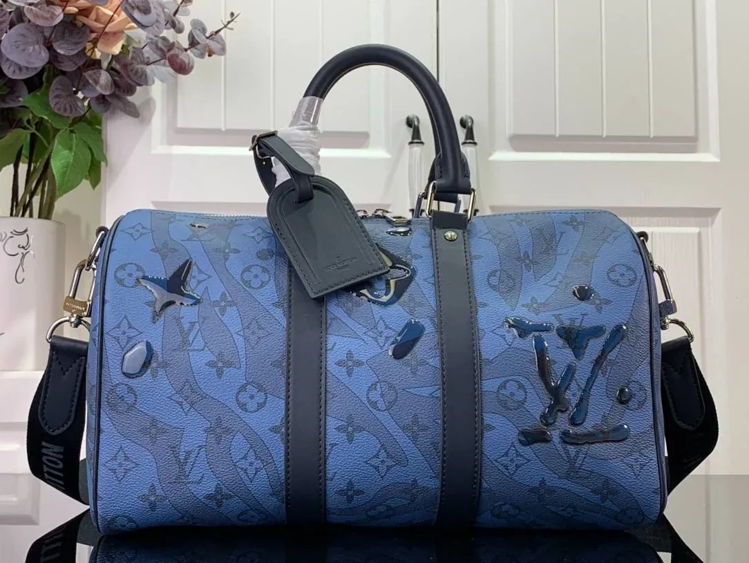 Louis Vuitton Keepall Bandouliere 35 Travel Bag in Blue Silver Hardware