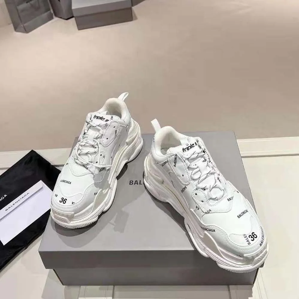 Balenciaga Triple S Sneaker Allover Logo in White and Black Technical Material for Unisex Balenciaga Triple S Sneaker Allover Logo in White and Black Technical Material for Unisex