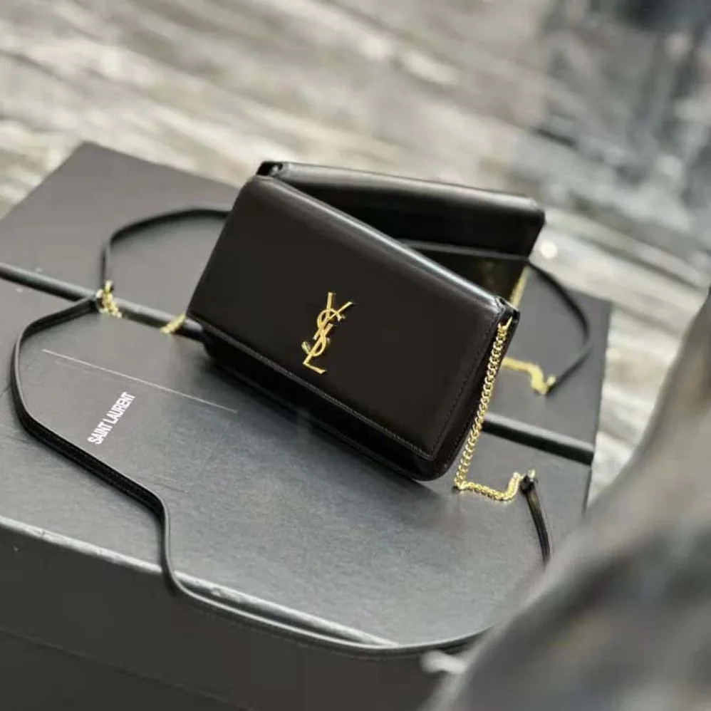 Saint Laurent YSL Cassandre Phone Holder with Strap in Smooth Leather for Women in Black Saint Laurent YSL Cassandre Phone Holder with Strap in Smooth Leather for Women in Black