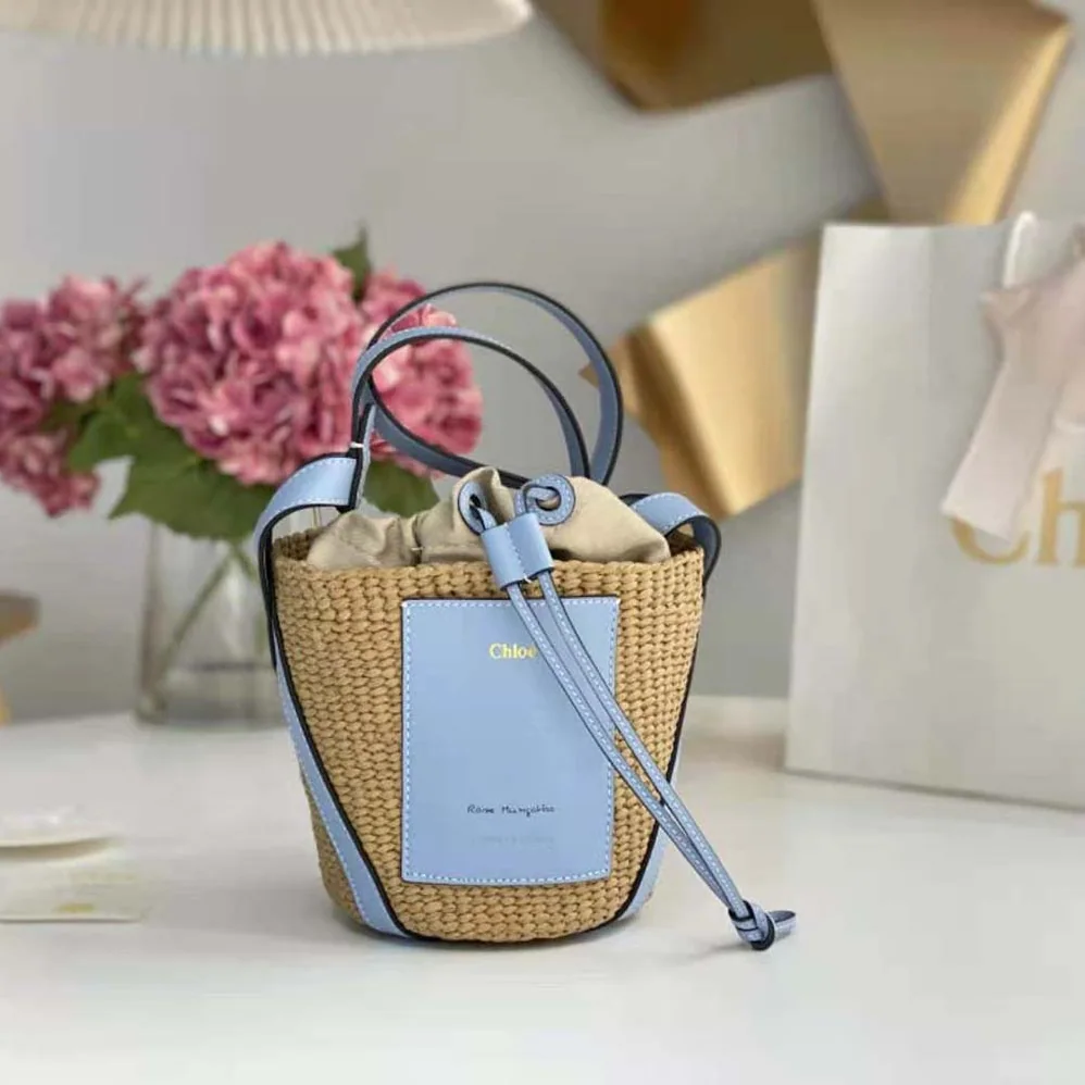 Chloe Small Basket in Fair-Trade Paper and Shiny Calfskin for Women in Blue Chloe Small Basket in Fair-Trade Paper and Shiny Calfskin for Women in Blue