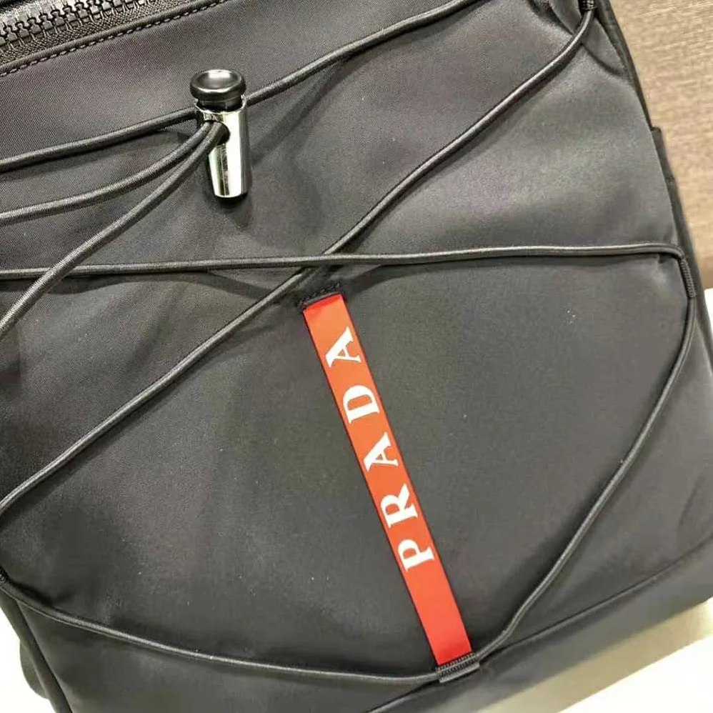 Prada Technical Fabric Backpack with a Functional and Versatile Design for Men in Black