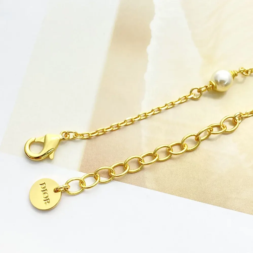 Dior Bloom in Dior Bracelet Gold-Finish Metal with White Resin Pearls and Silver for Women in Tone Crystals Dior Bloom in Dior Bracelet Gold-Finish Metal with White Resin Pearls and Silver for Women in Tone Crystals