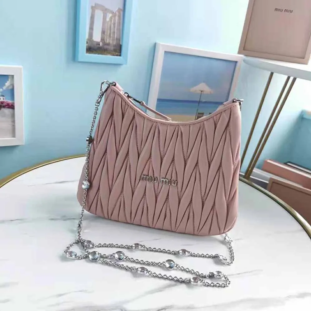 Miu Miu Small Matelasse Nappa Leather Shoulder Bag for Women in Pink Miu Miu Small Matelasse Nappa Leather Shoulder Bag for Women in Pink
