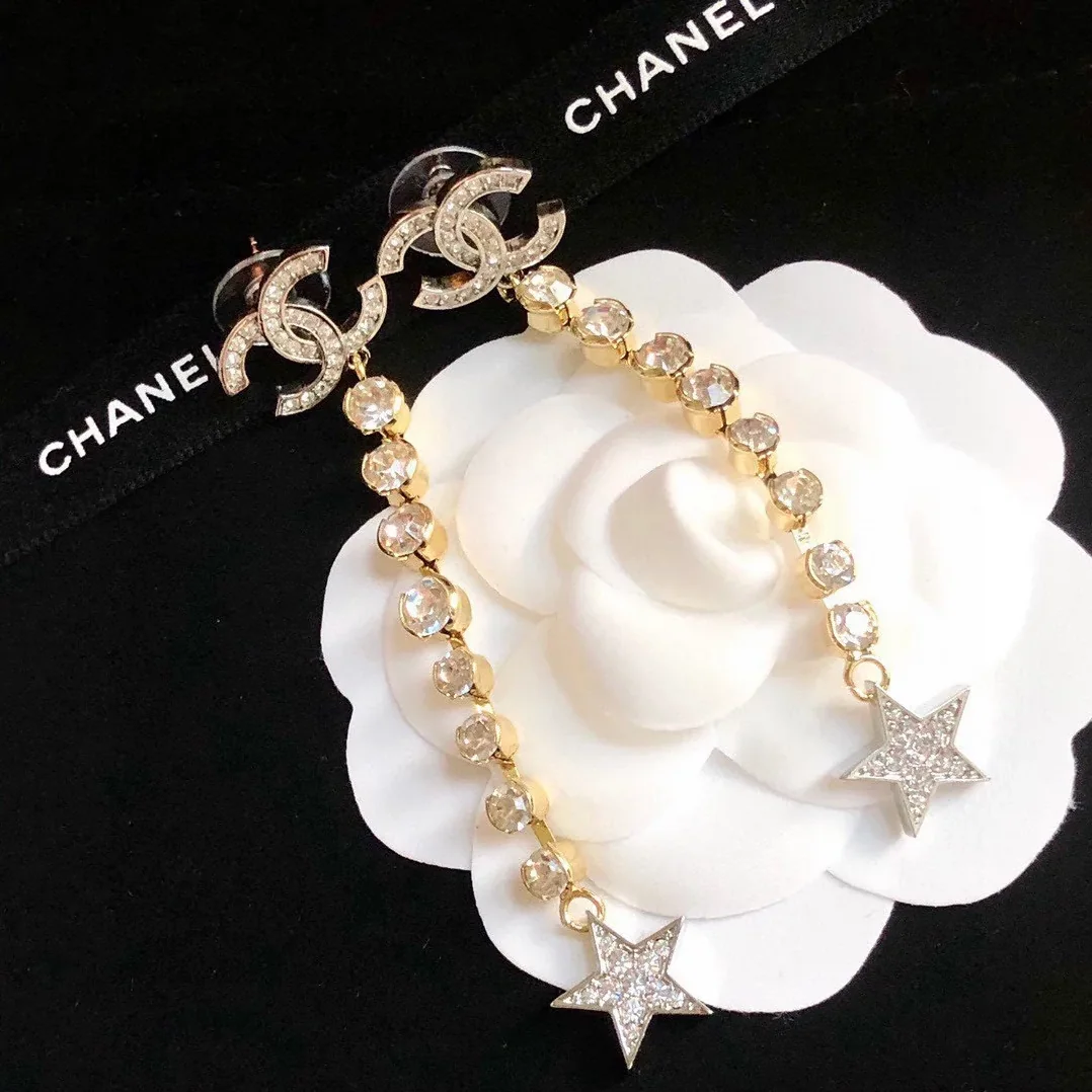 Chanel Long Star Earrings Gold Chanel Long Star Earrings Gold