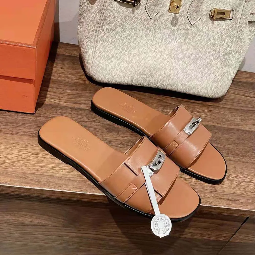Hermes Giulia Sandal in Calfskin with Iconic Palladium-Plated Kelly Buckle for Women in Brown Hermes Giulia Sandal in Calfskin with Iconic Palladium-Plated Kelly Buckle for Women in Brown