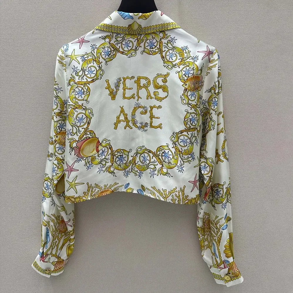 Versace Underwater Barocco Knotted Crop Silk Shirt for Women in Yellow Versace Underwater Barocco Knotted Crop Silk Shirt for Women in Yellow