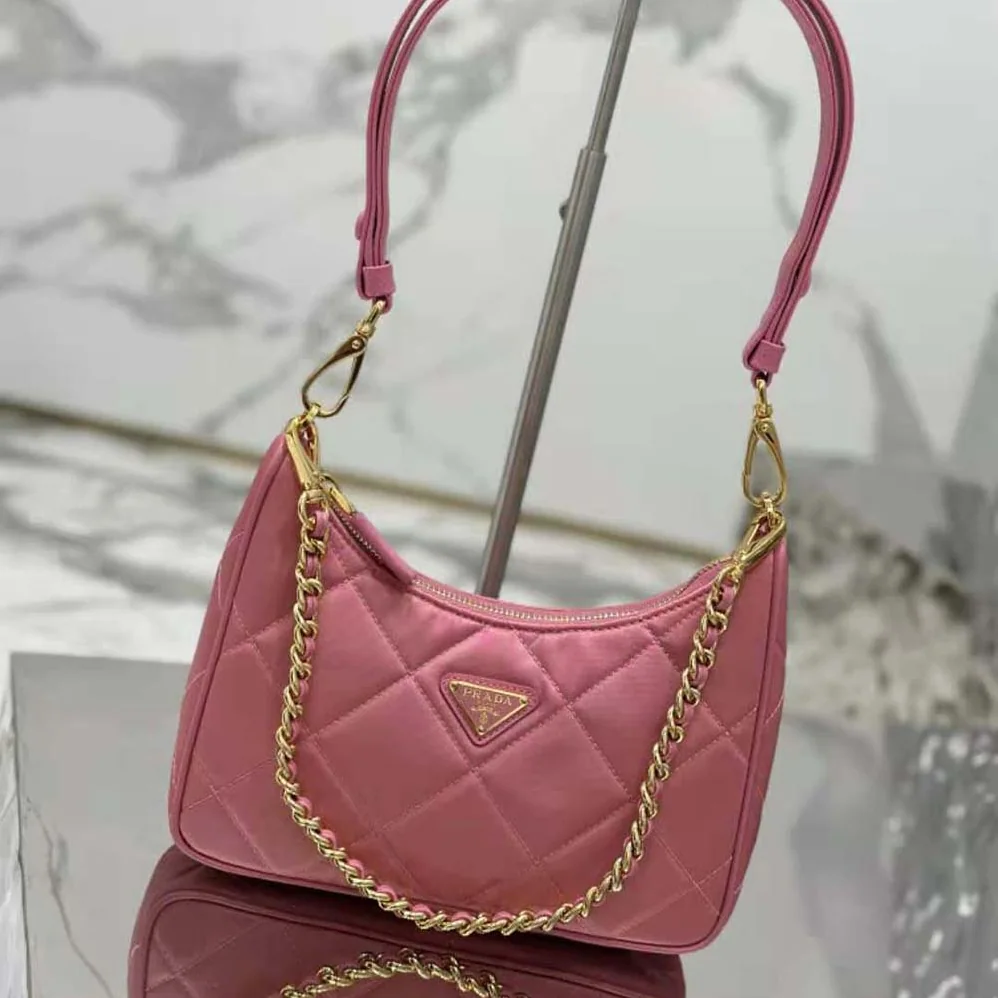 Prada Re-Edition 1995 Chaîne Re-Nylon Mini-bag for Women in Pink