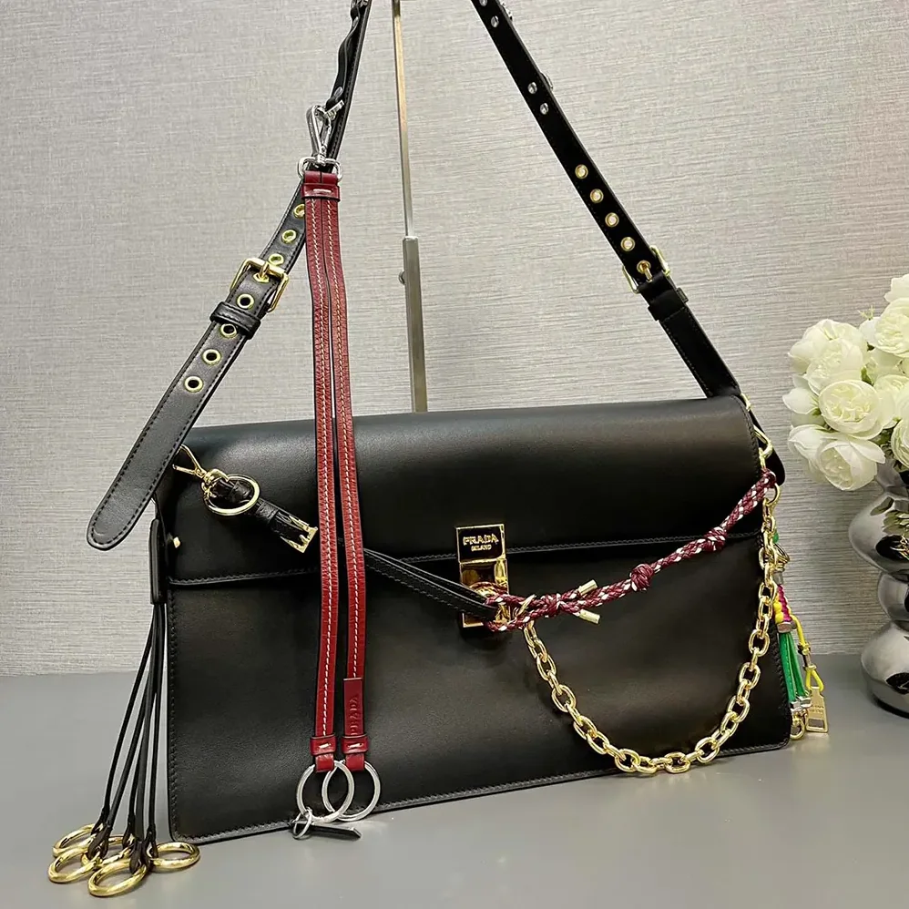 Prada Soft Sound Large Leather Shoulder Bag with Charms for Women in Black