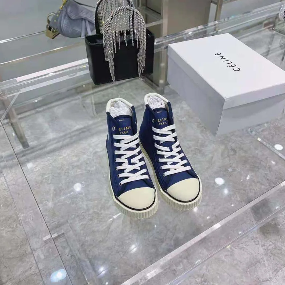 Celine Blank Mid Lace up Sneaker with Toe Cap in Canvas and Calfskin for Women Celine Blank Mid Lace up Sneaker with Toe Cap in Canvas and Calfskin for Women
