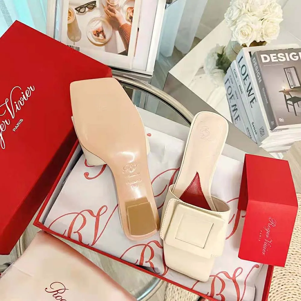 Roger Vivier Covered Buckle Mules in Patent Leather for Women in White Roger Vivier Covered Buckle Mules in Patent Leather for Women in White