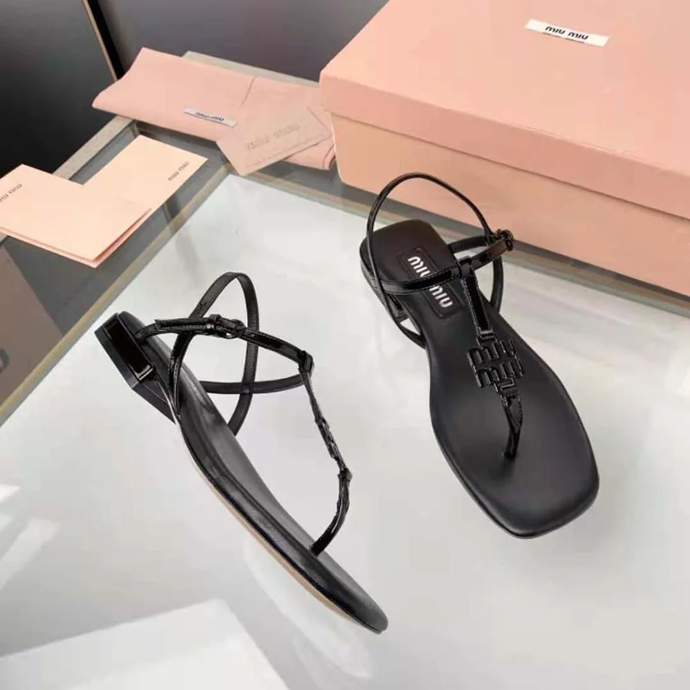 Miu Miu Patent Thong Sandals with Metal Lettering Logo for Women in Black Miu Miu Patent Thong Sandals with Metal Lettering Logo for Women in Black