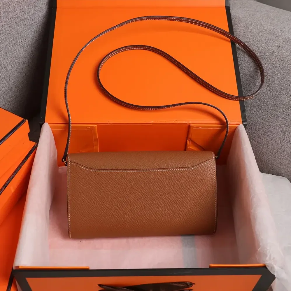 Hermes Constance Long To Go in Epsom Leather for Women in Brown/Gold