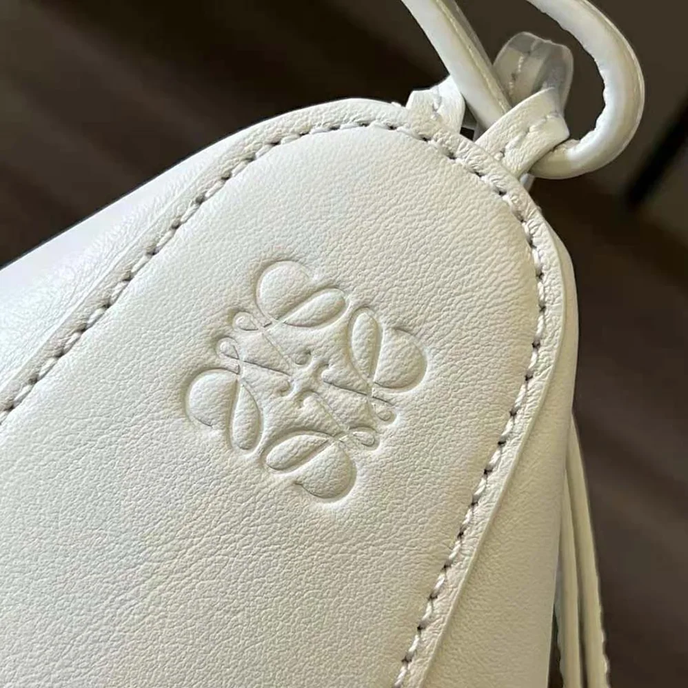 Loewe Mini Hammock Hobo Bag in Classic Calfskin for Women in White Loewe Mini Hammock Hobo Bag in Classic Calfskin for Women in White