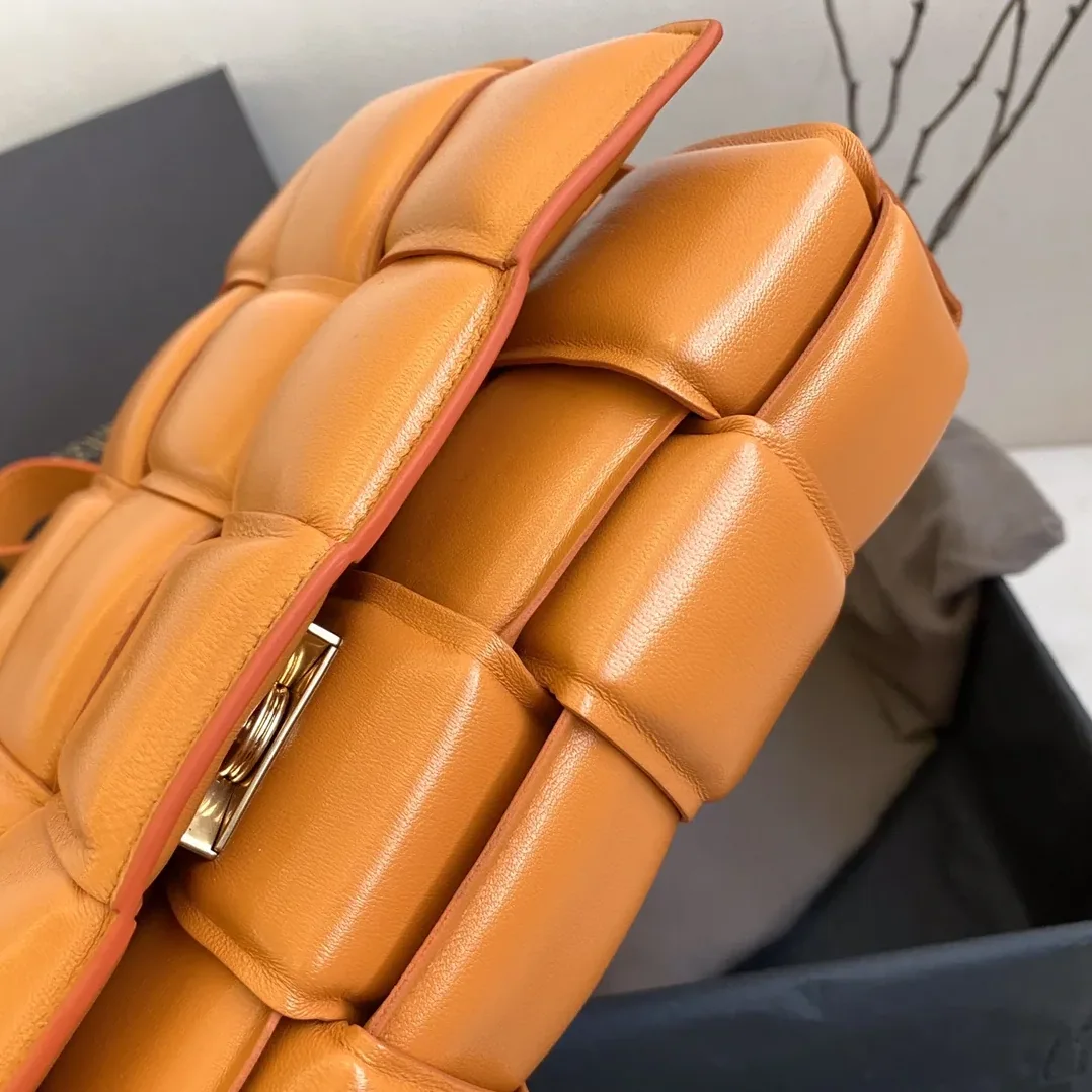 Bottega Veneta Padded Cassette Bag in In Orange