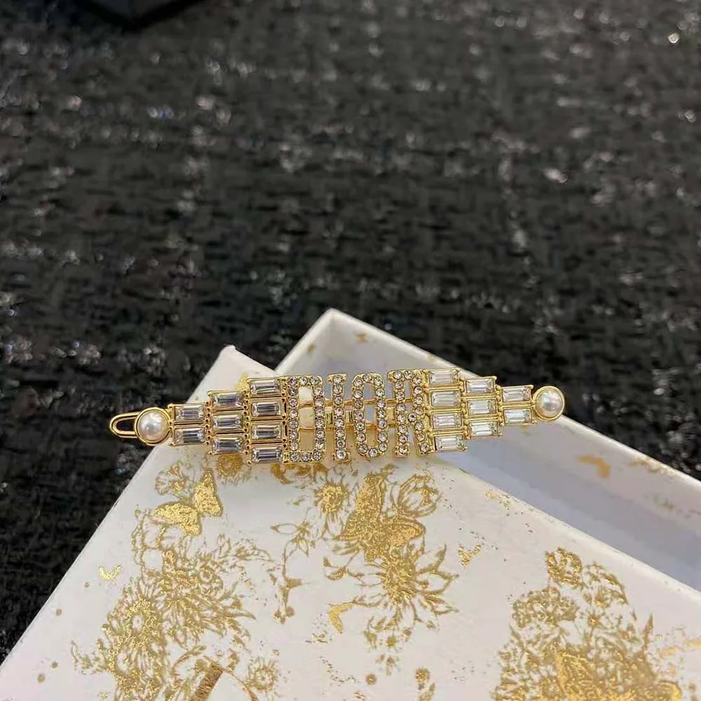 Dior Dio(r)evolution Barrette Gold-Finish Metal with White Crystals and White Resin Pearls for Women Dior Dio(r)evolution Barrette Gold-Finish Metal with White Crystals and White Resin Pearls for Women