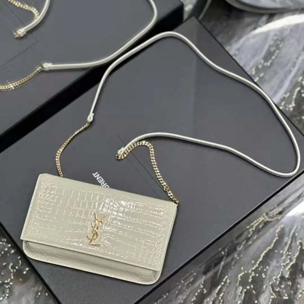 Saint Laurent YSL Cassandre Phone Holder with Strap in Shiny Crocodile-Embossed Leather for Women in White Saint Laurent YSL Cassandre Phone Holder with Strap in Shiny Crocodile-Embossed Leather for Women in White