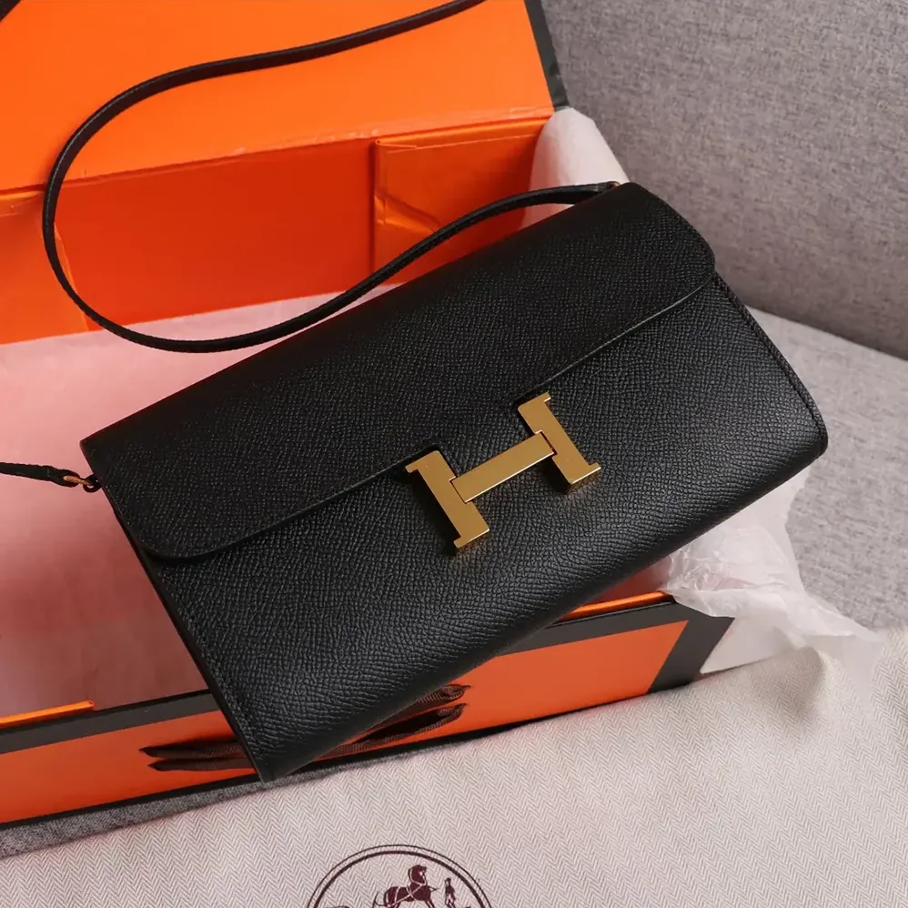 Hermes Constance Long To Go in Epsom Leather for Women in Black/Gold