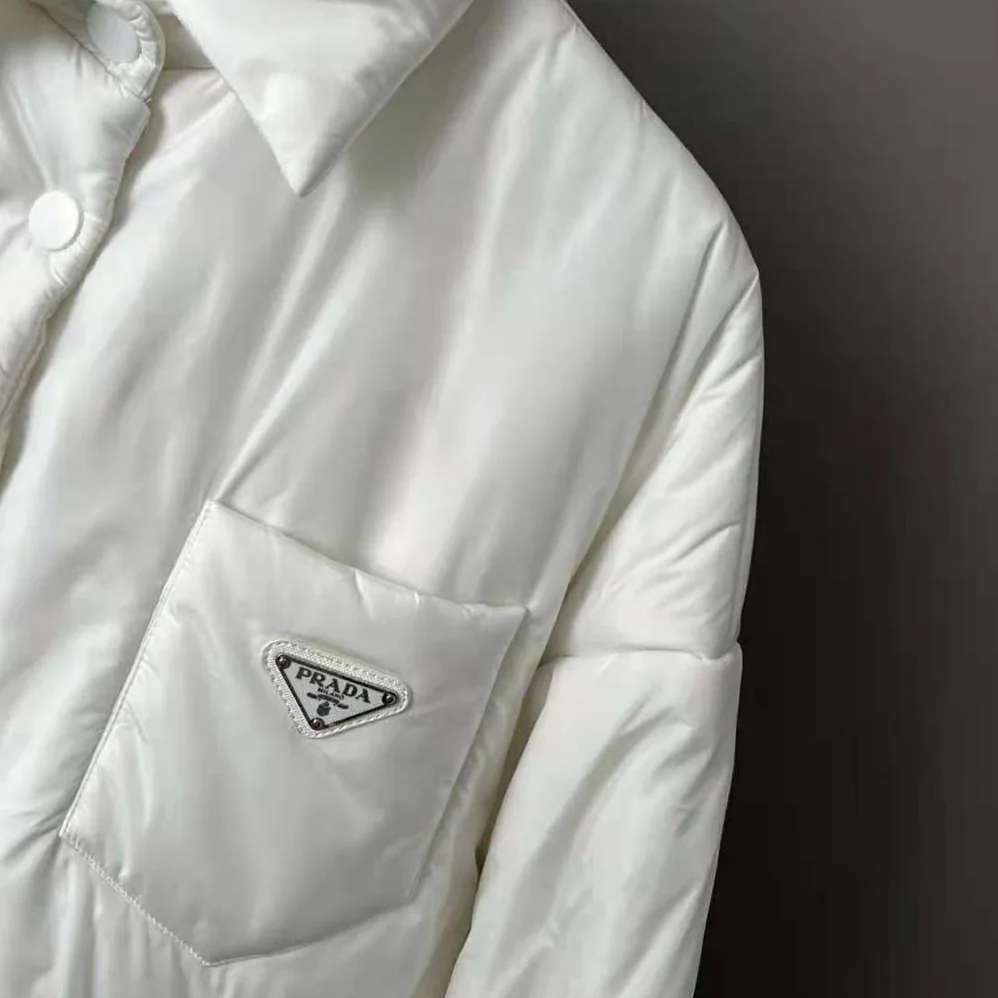 Prada Light Re-Nylon Padded Jacket for Women in White Prada Light Re-Nylon Padded Jacket for Women in White