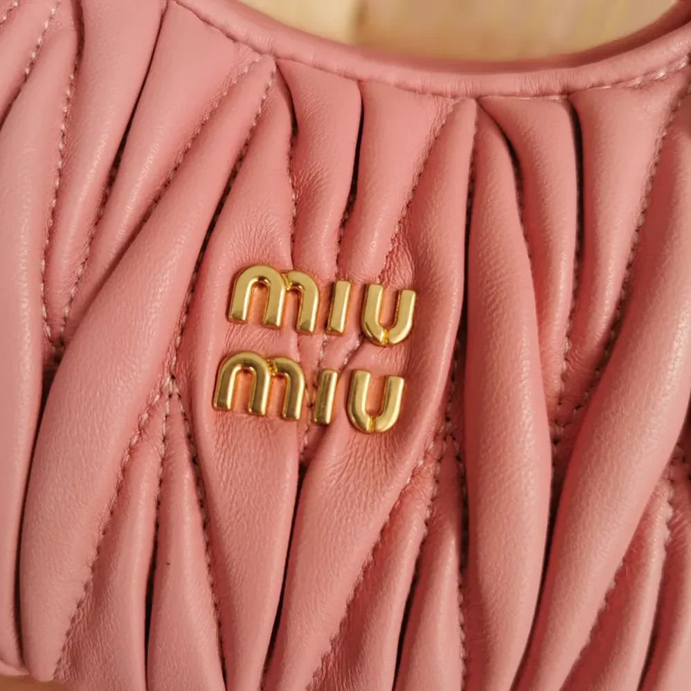 Miu Miu Wander Matelassé Nappa Leather Hobo Mini-Bag for Women in Pink