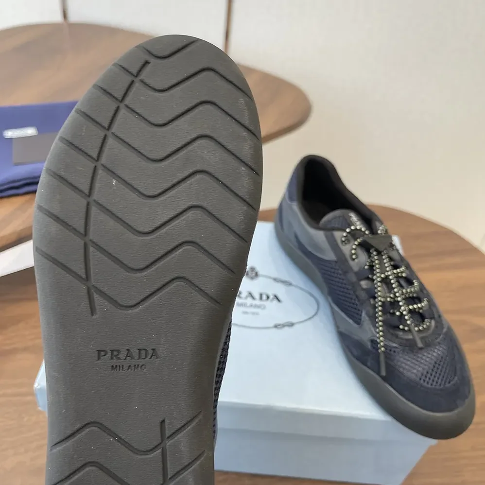 Prada Speedrock Leather And Mesh Fabric Sneakers for Unisex in Black