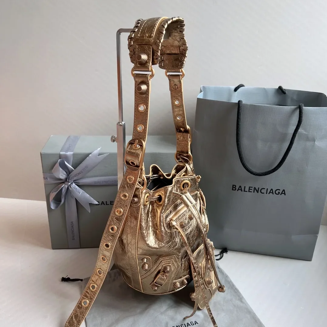 Balenciaga Le Cagole Xs Bucket Bag Metallized With Rhinestones In Gold Tone / Balenciaga Le Cagole Xs Bucket Bag Metallized With Rhinestones In Gold Tone /