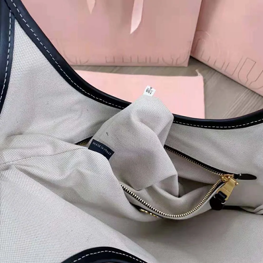 Miu Miu IVY Leather Bag with Leather Lettering Logo for Women in Black Miu Miu IVY Leather Bag with Leather Lettering Logo for Women in Black