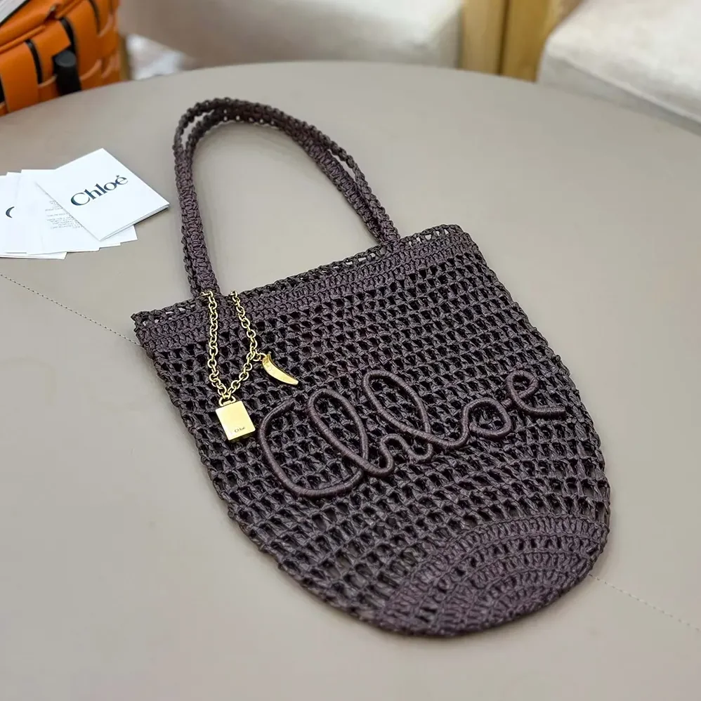 Chloe Small Summer Banana Tote Bag in Raffia for Women in Kohl Brown Chloe Small Summer Banana Tote Bag in Raffia for Women in Kohl Brown