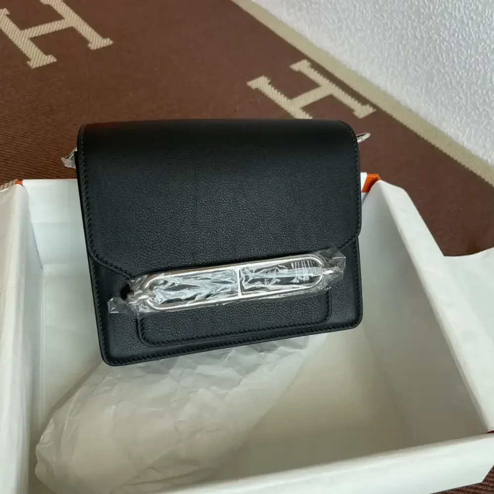 Hermes Roulis Mini Bag in Evercolor Calfskin for Women in Black/Silver Hermes Roulis Mini Bag in Evercolor Calfskin for Women in Black/Silver