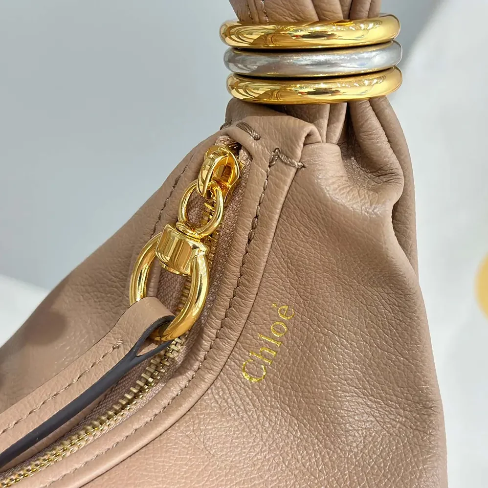 Chloe Small Bracelet Hobo Bag in Grained Leather for Women in Pink Chloe Small Bracelet Hobo Bag in Grained Leather for Women in Pink