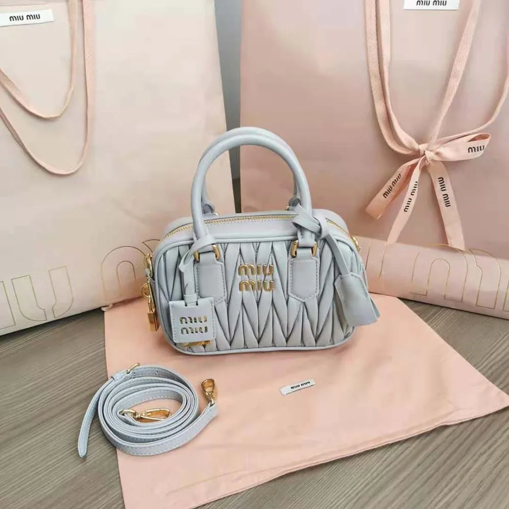 Miu Miu Matelassé Nappa Leather Top-Handle Bag for Women in Silver Miu Miu Matelassé Nappa Leather Top-Handle Bag for Women in Silver