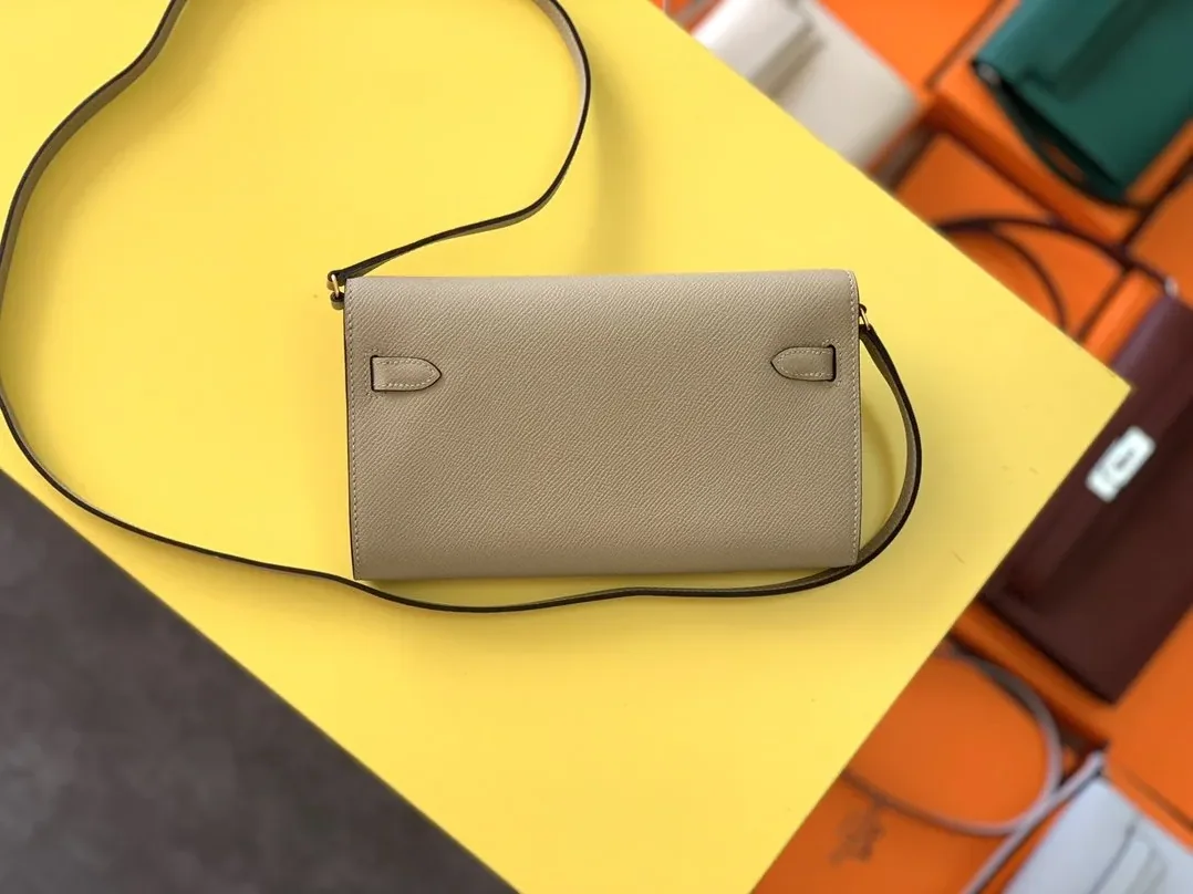 Hermes Kelly Classique To Go Wallet in Gold Toned Hardware Cream