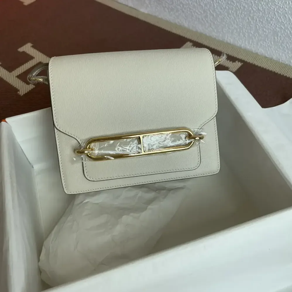 Hermes Roulis Mini Bag in Evercolor Calfskin for Women in White/Gold Hermes Roulis Mini Bag in Evercolor Calfskin for Women in White/Gold