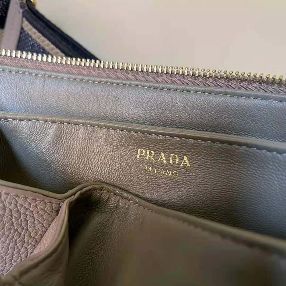 Prada Leather Shoulder Bag with Metal Lettering Logo for Women in Gray Prada Leather Shoulder Bag with Metal Lettering Logo for Women in Gray