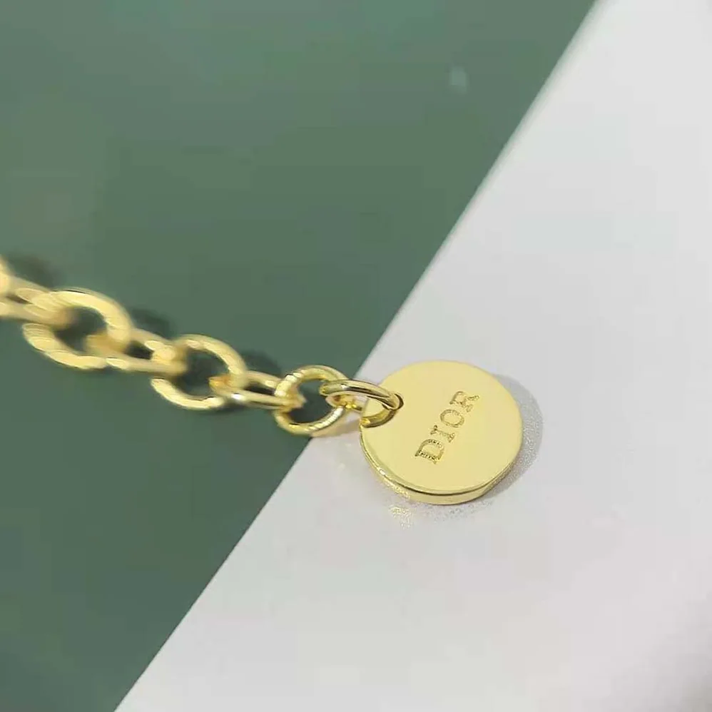 Dior Dio(r)evolution Necklace Gold-Finish Metal with a White Resin Pearl for Women Dior Dio(r)evolution Necklace Gold-Finish Metal with a White Resin Pearl for Women