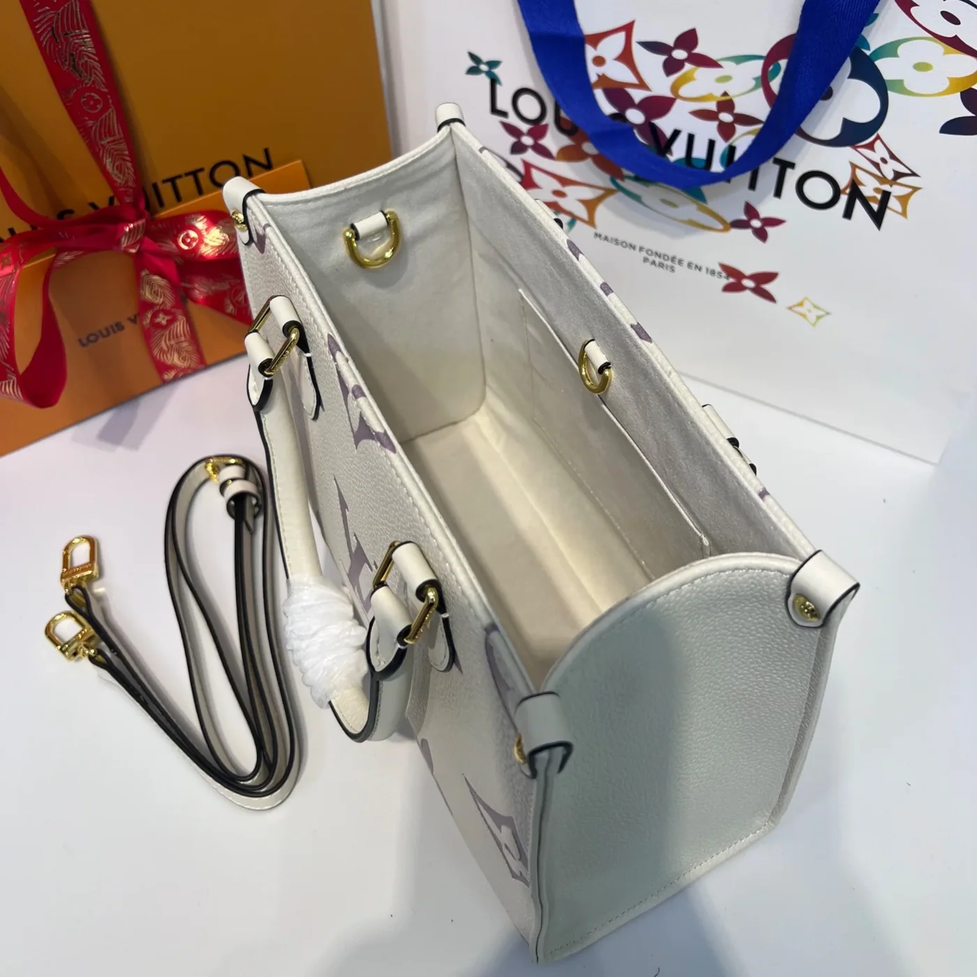 Louis Vuitton Onthego PM Tote Bag in Grey/Beige Gold Hardware