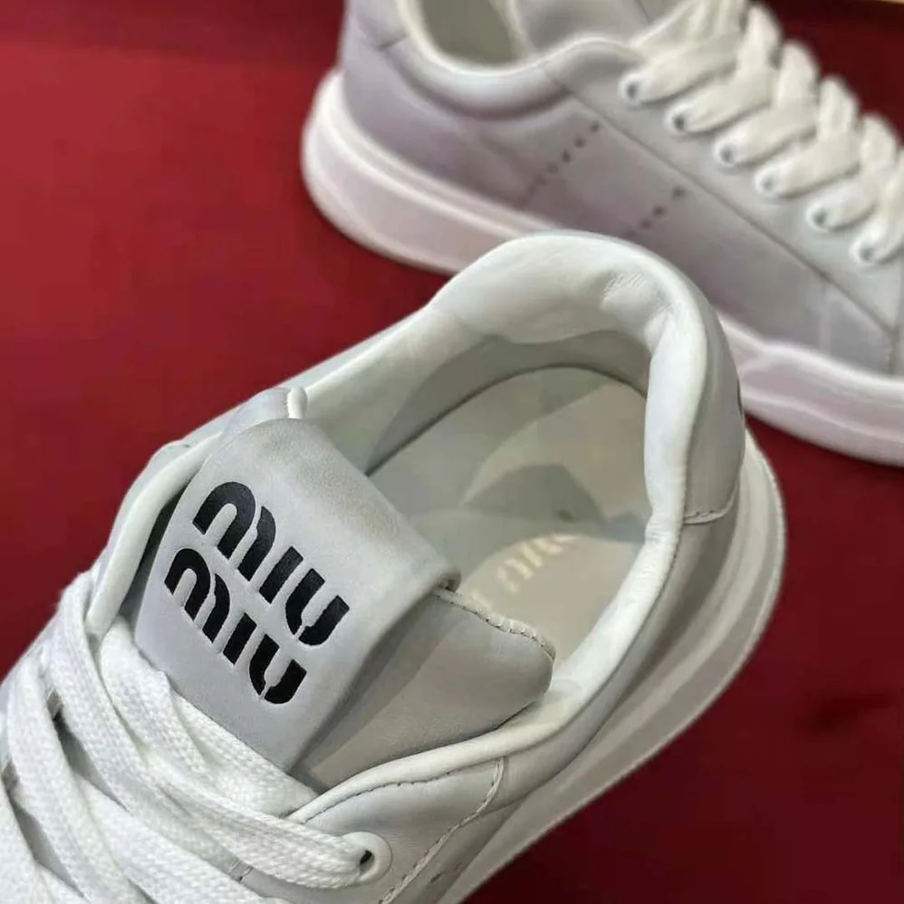 Miu Miu Bleached Leather Sneakers for Women in White