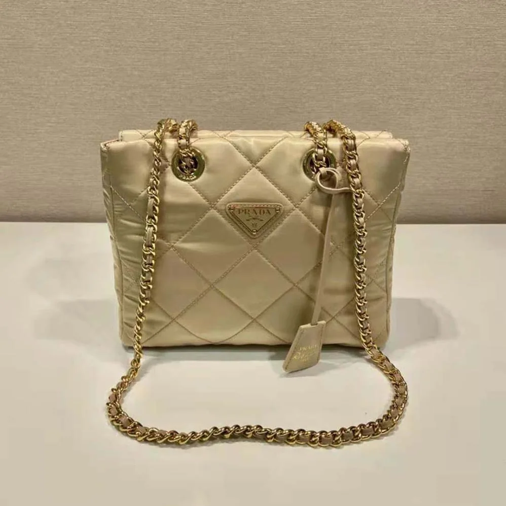 Prada Re-Edition 1995 Chaîne Re-Nylon Tote Bag for Women in Beige Prada Re-Edition 1995 Chaîne Re-Nylon Tote Bag for Women in Beige
