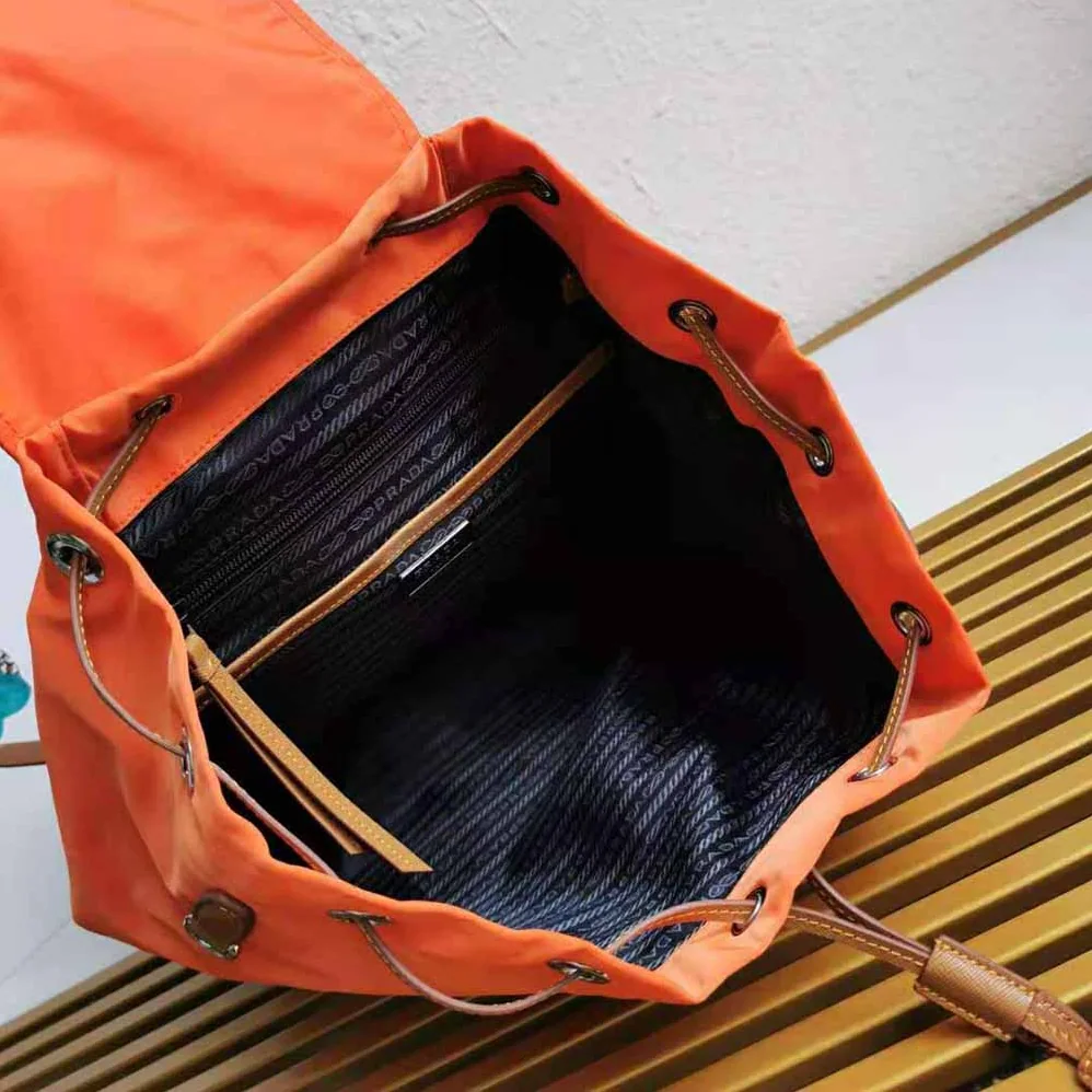 Prada Nylon and Saffiano Leather Backpack for Women in Orange Prada Nylon and Saffiano Leather Backpack for Women in Orange