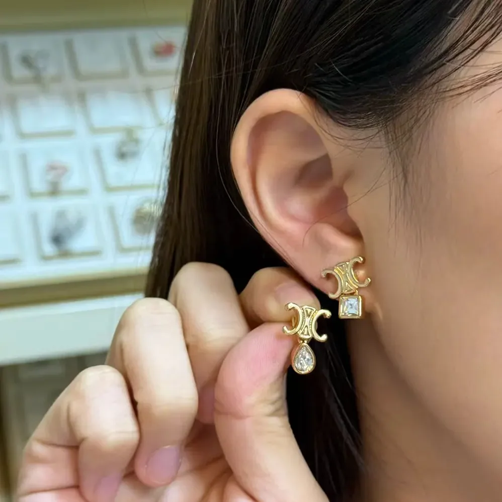 Celine Triomphe Twinkle Earrings in Strass and Brass with Gold Finish for Women