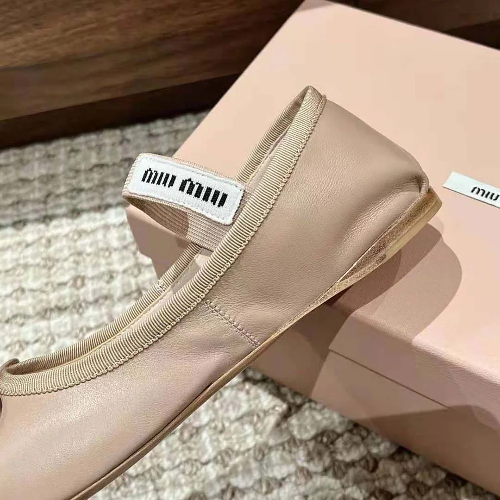 Miu Miu Leather Ballerinas with Fabric Logo Label for Women in Beige