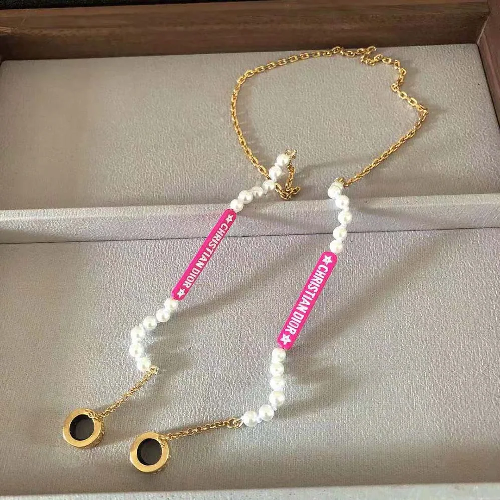 Dior D-Vibe Necklace for Headphones Gold-Finish Metal and White Resin Pearls for Women Dior D-Vibe Necklace for Headphones Gold-Finish Metal and White Resin Pearls for Women