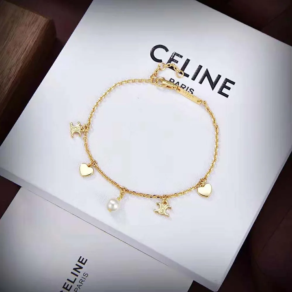 Celine Cœur Celine Charms Bracelet in Brass with Gold Finish and Resin Pearl for Women