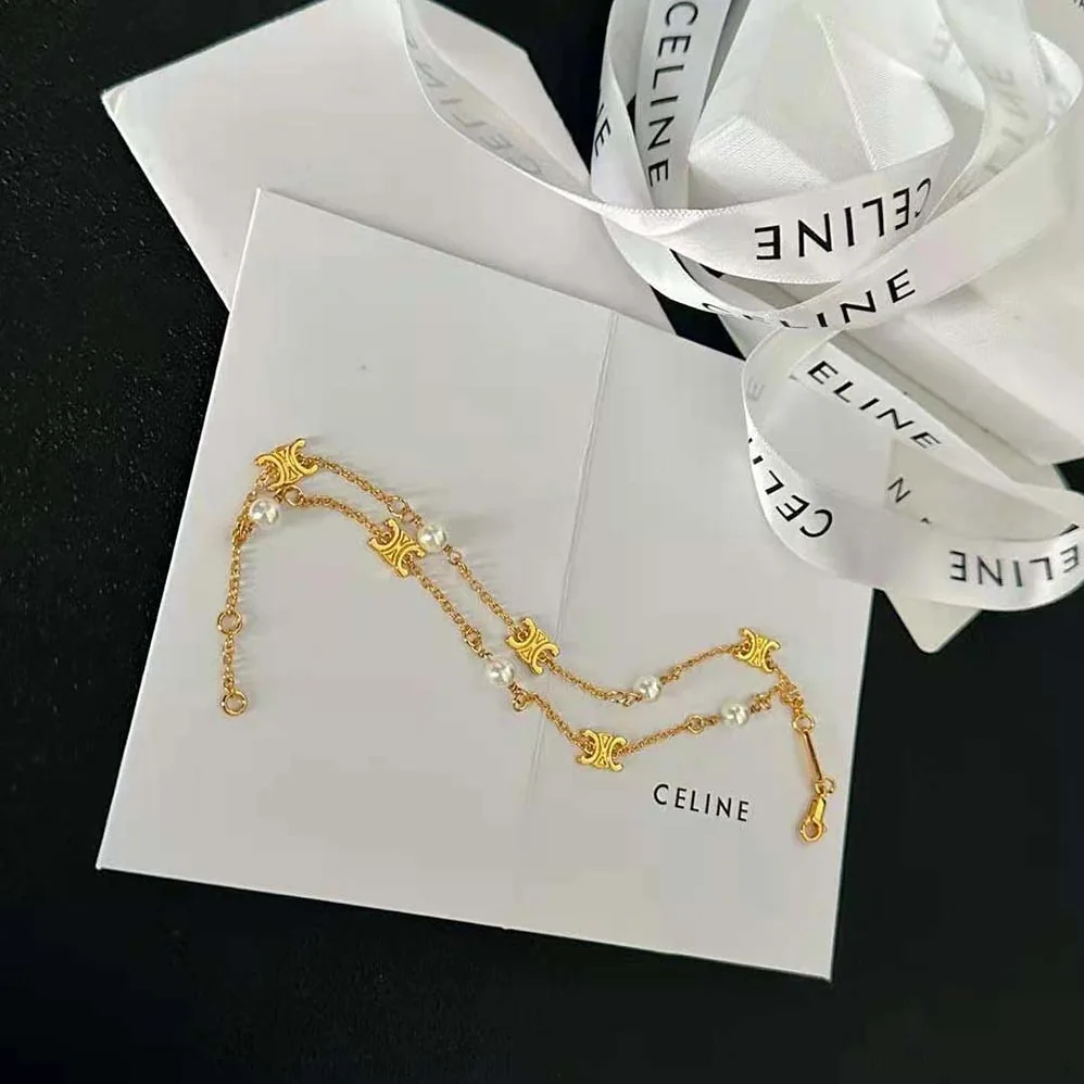 Celine Triomphe Pearl Double Bracelet in Brass with Gold Finish and Resin Pearls for Women